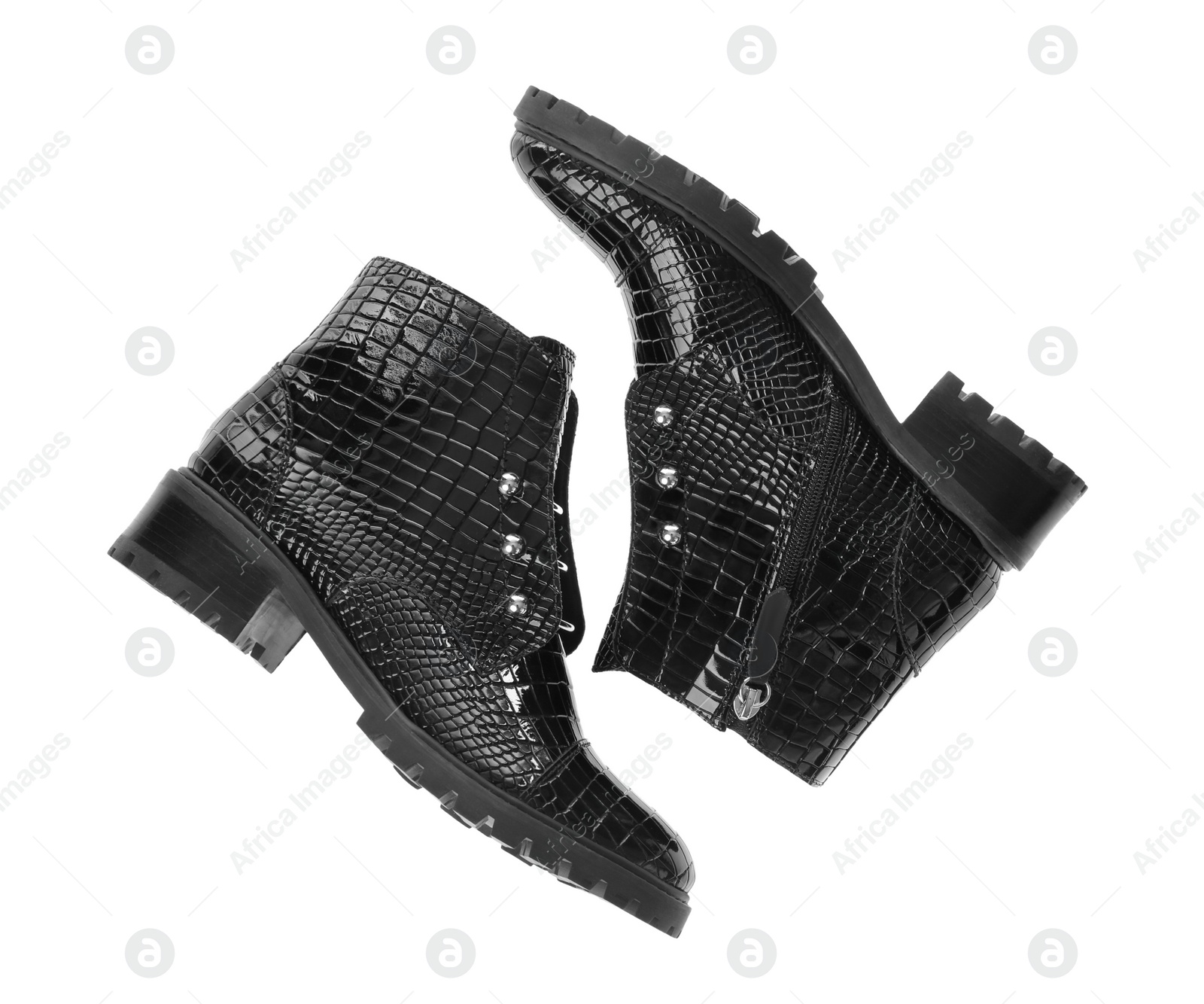 Photo of Pair of stylish ankle boots isolated on white, top view