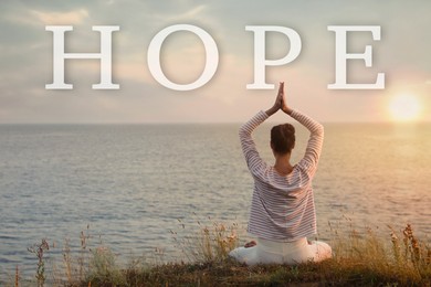 Image of Concept of hope. Woman meditating near sea, back view