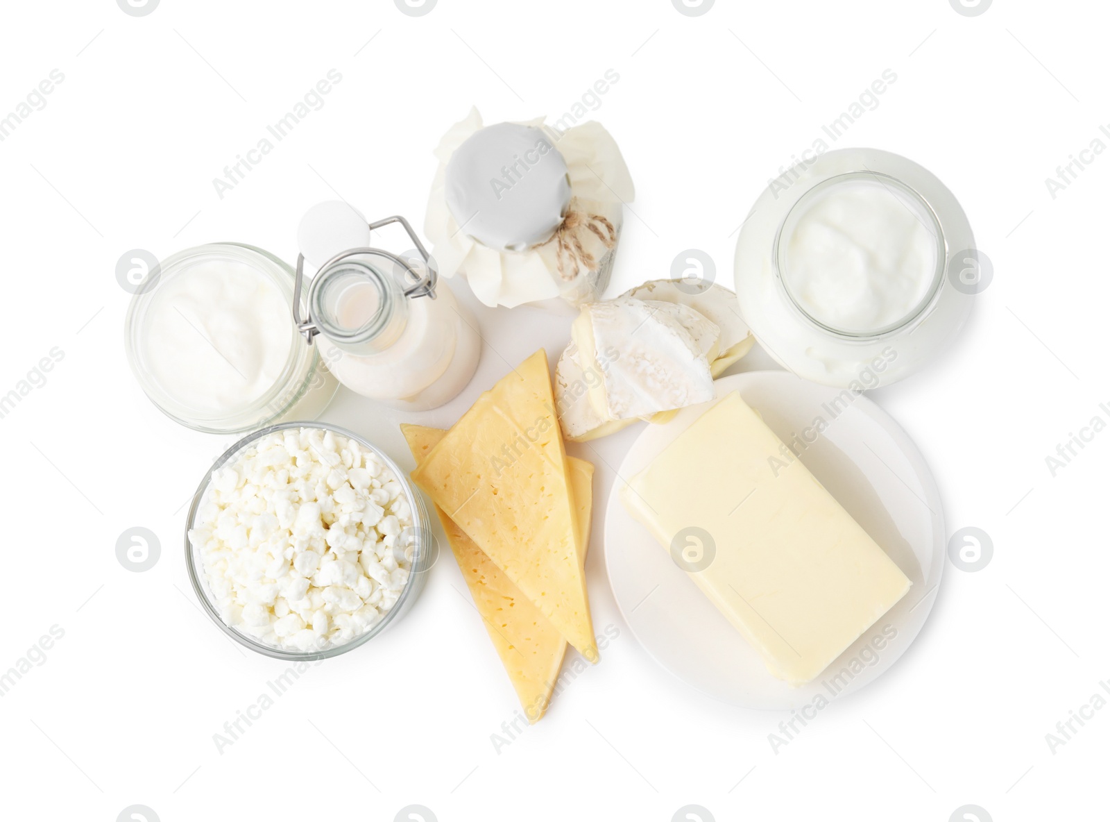 Photo of Different fresh dairy products isolated on white, top view