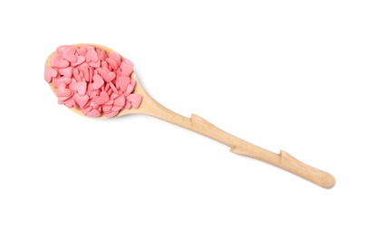 Photo of Wooden spoon with sweet candy hearts on white background, top view