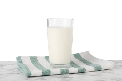 One glass of tasty milk and kitchen towel on marble table against white background