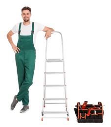 Photo of Worker in uniform near metal ladder on white background