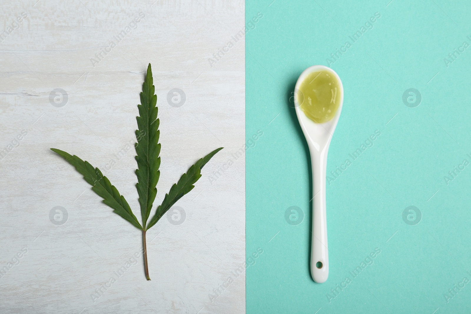 Photo of Flat lay composition with hemp lotion on color background