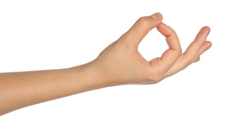 Woman showing mudra on white background, closeup of hand
