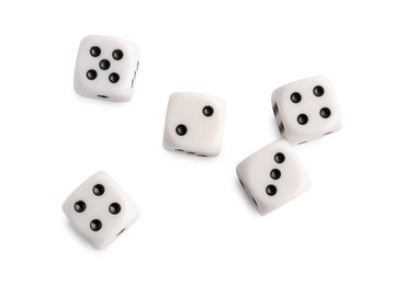 Photo of Many dices isolated on white, top view. Game cubes