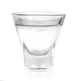 Shot glass of vodka on white background. Alcoholic drink