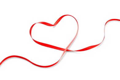 Photo of Heart made of red ribbon on white background