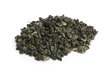 Pile of dried green tea leaves on white background