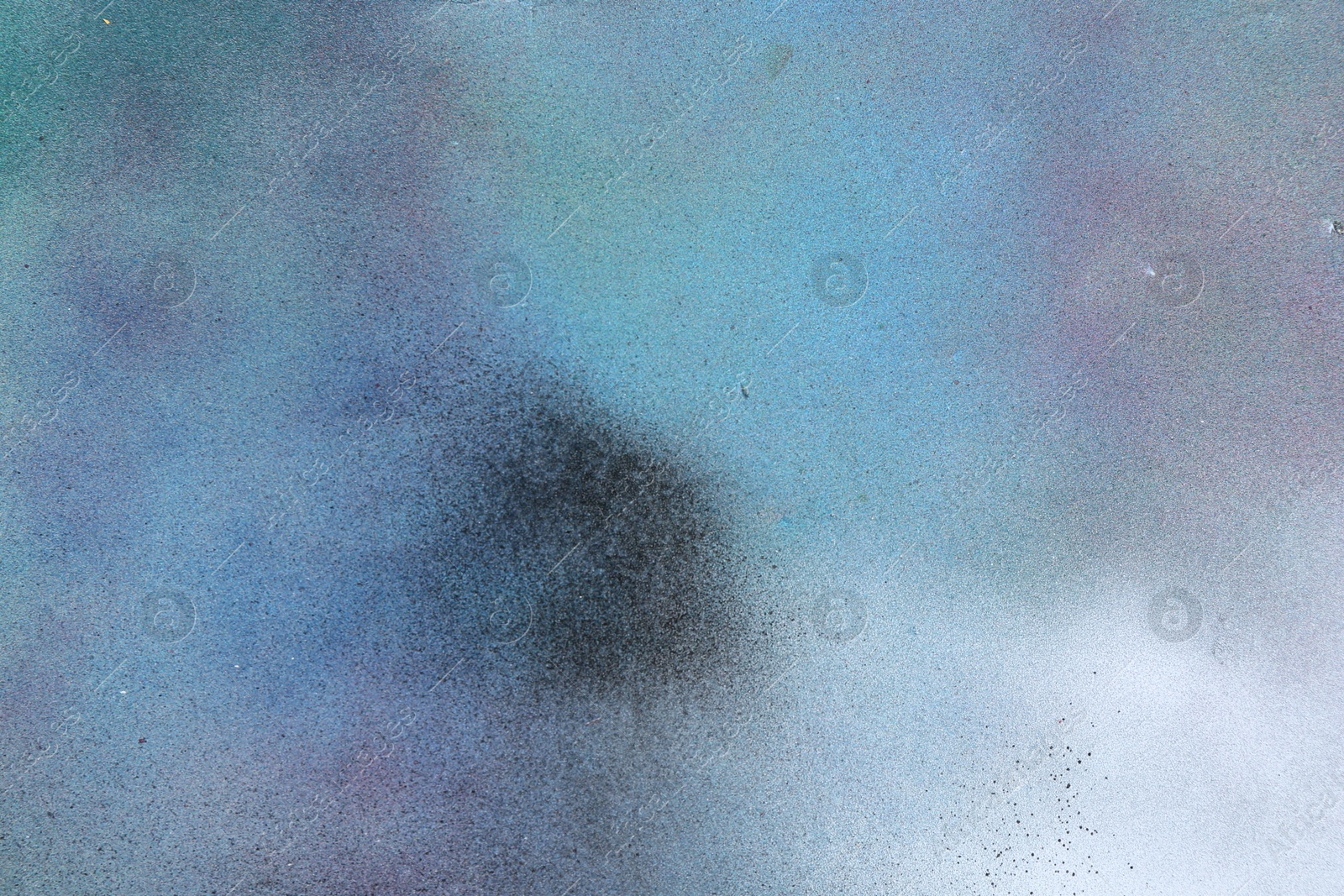 Photo of Texture of abstract spray paint as background, top view