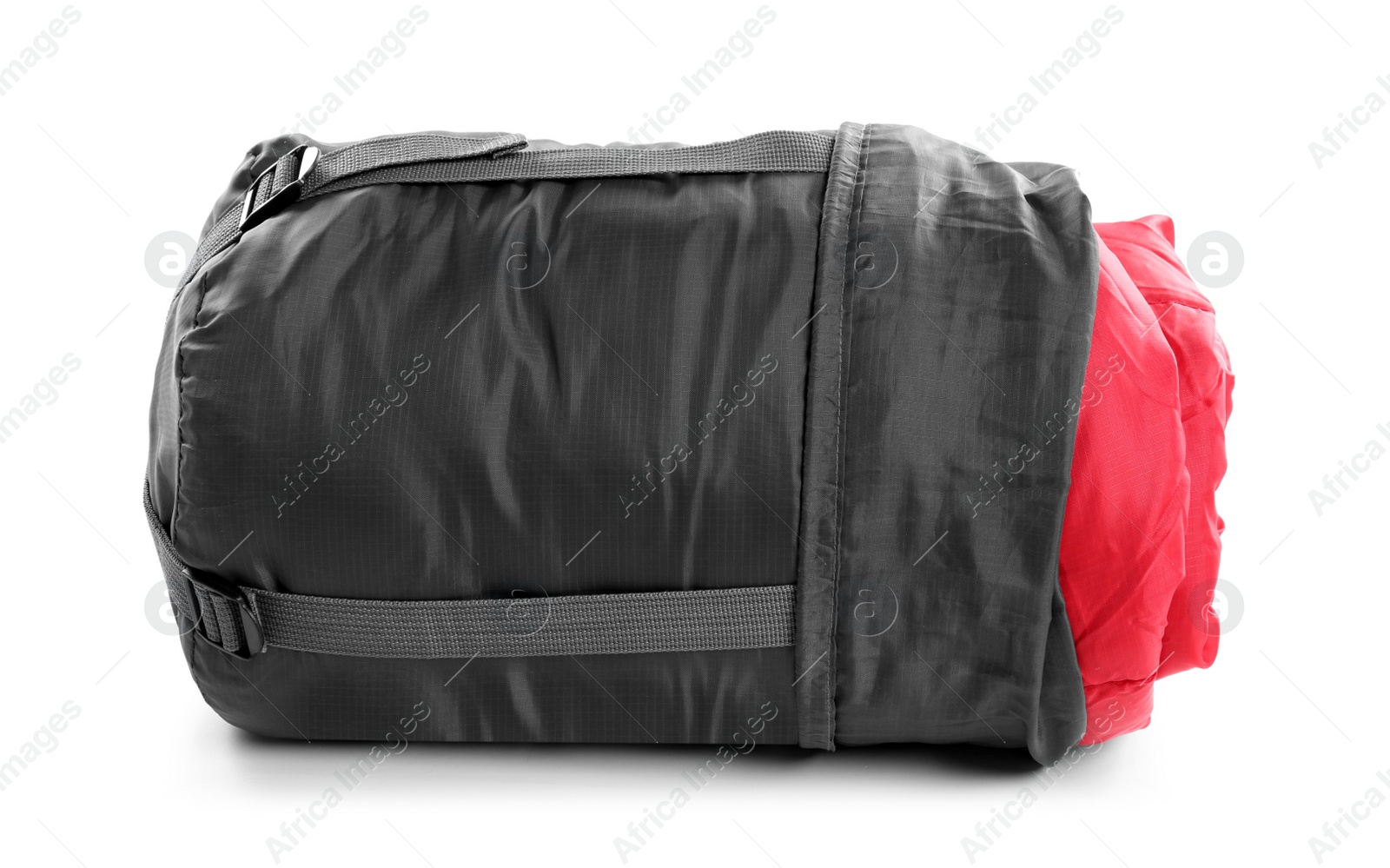 Photo of Rolled sleeping bag on white background. Camping equipment