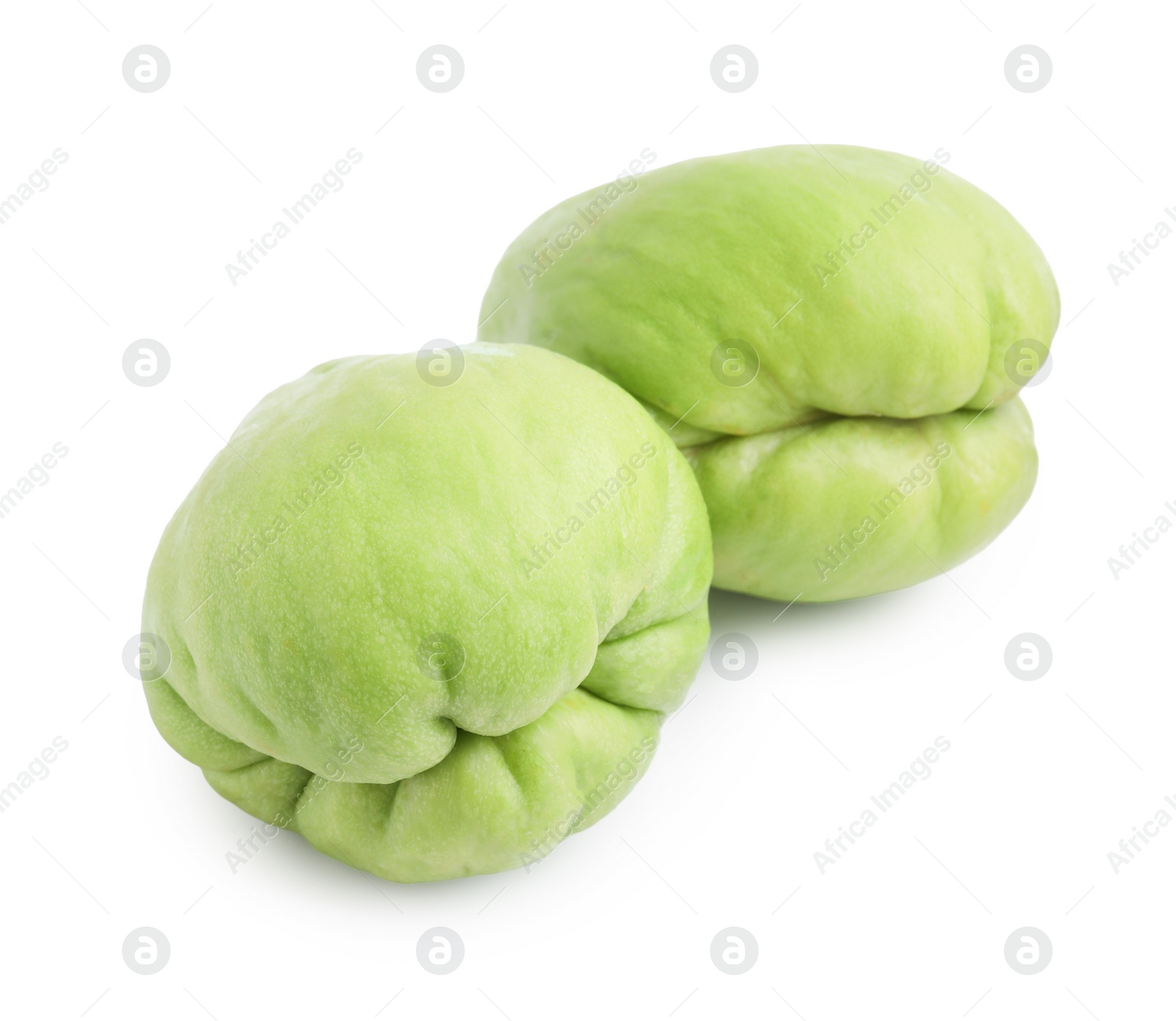 Photo of Two fresh green chayote isolated on white