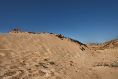 Photo of Picturesque view of desert on sunny day