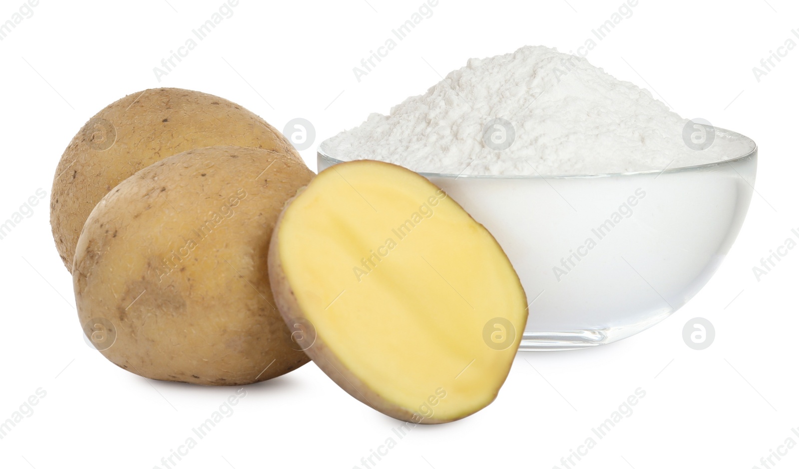 Photo of Glass bowl of starch and fresh raw potatoes on white background