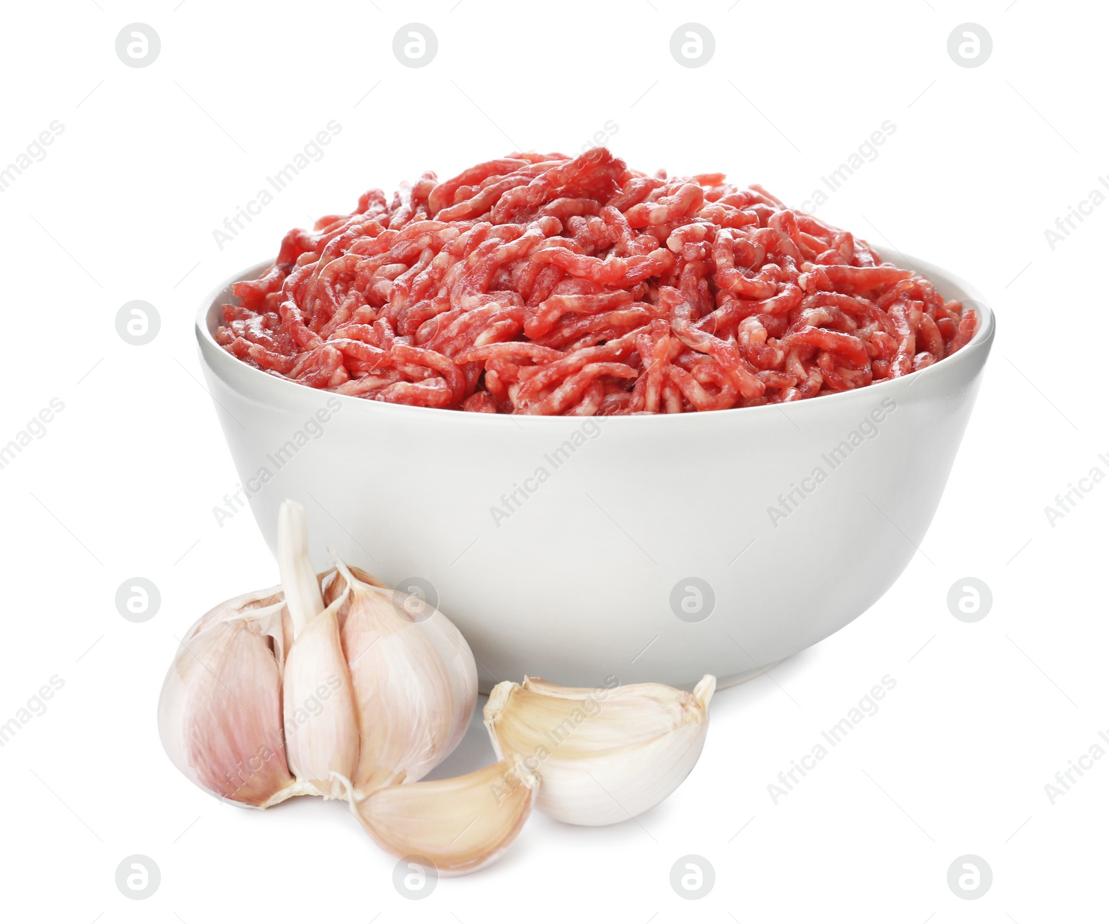 Photo of Fresh raw minced meat and garlic on white background