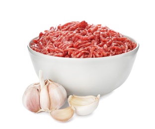 Fresh raw minced meat and garlic on white background