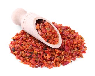 Aromatic spice. Pile of red chili pepper flakes and scoop isolated on white