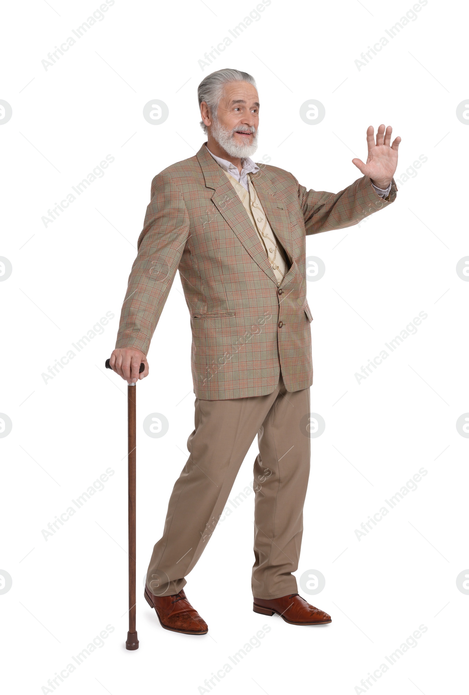 Photo of Senior man with walking cane waving on white background