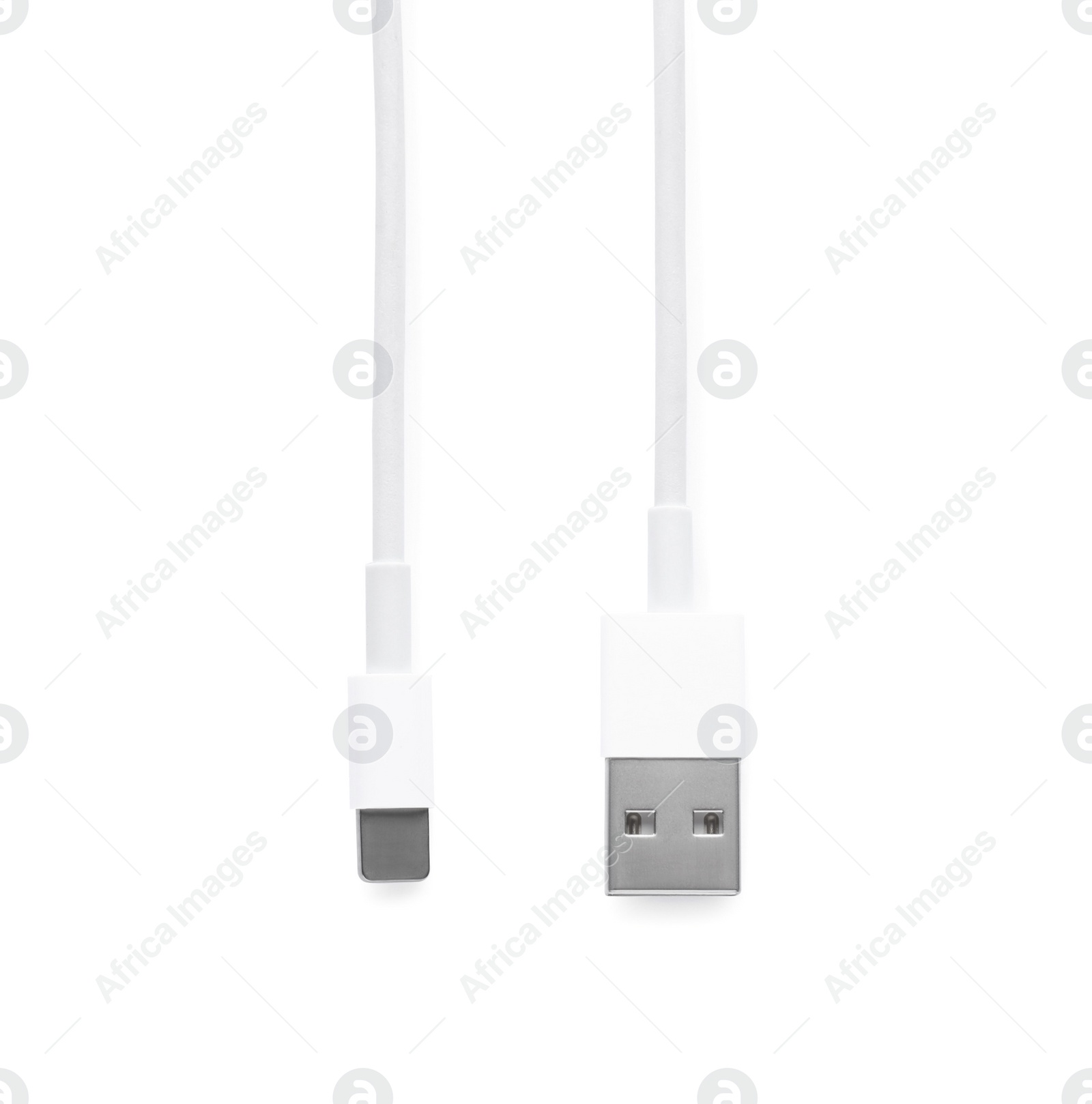 Photo of USB to lightning cable isolated on white, top view. Modern technology