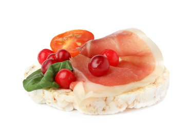 Photo of Puffed rice cake with prosciutto, berries and tomato isolated on white