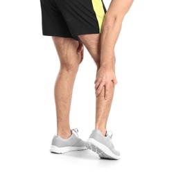 Photo of Man suffering from leg pain on white background, closeup