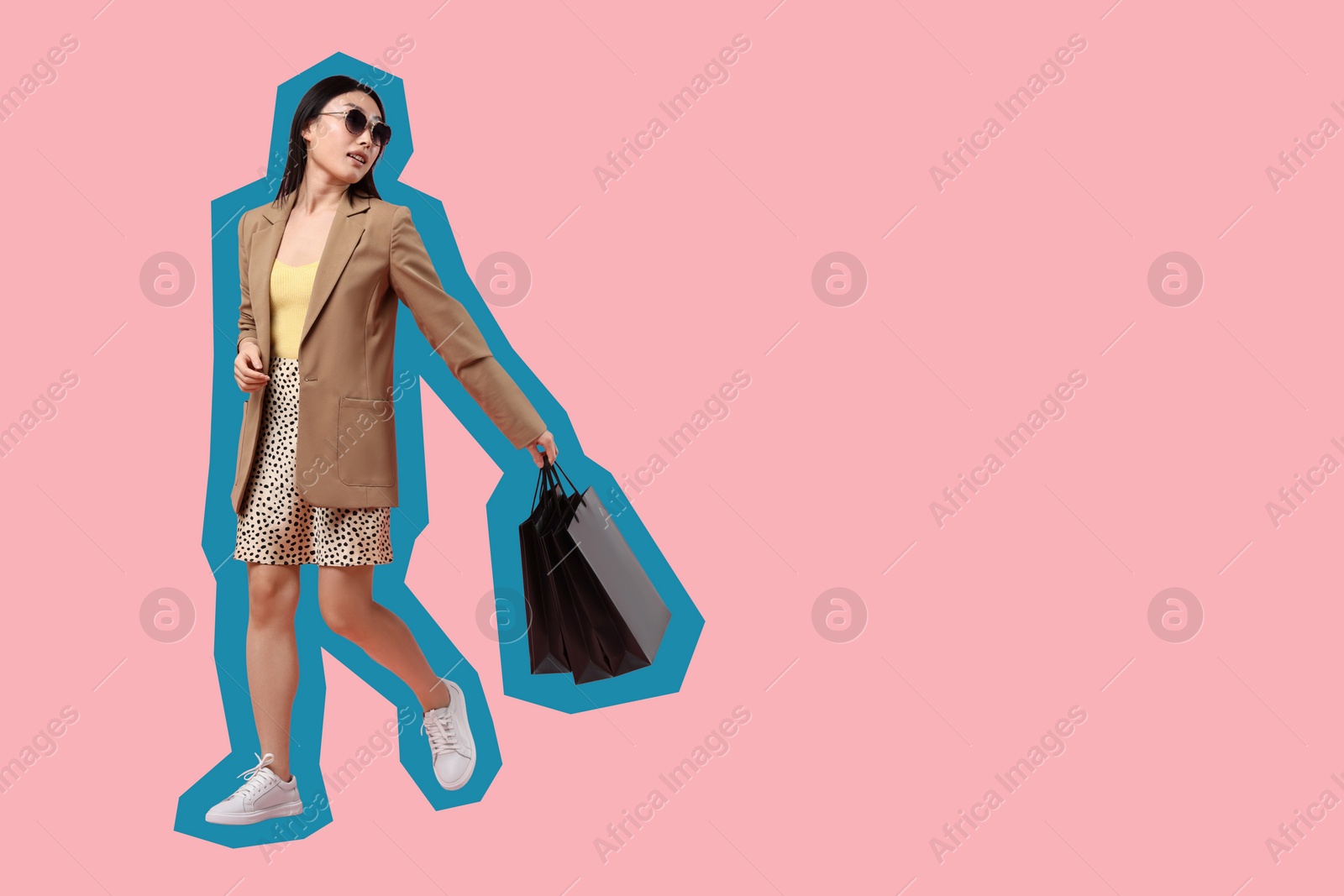 Image of Woman with shopping bags on pink background, space for text