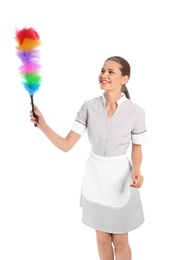 Photo of Young chambermaid with dusting brush on white background