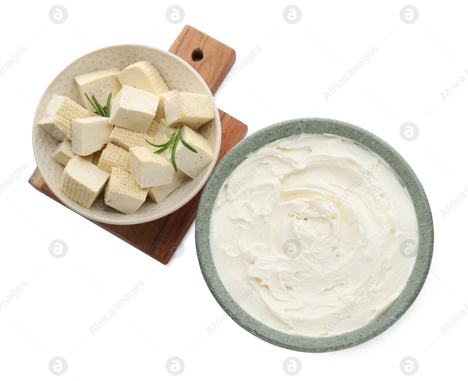 Photo of Different types of delicious tofu cheese on white background, top view