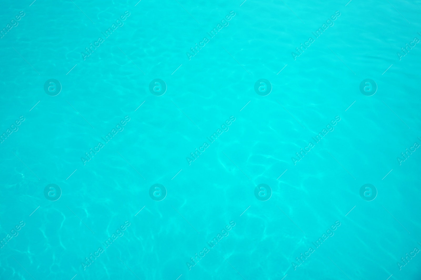 Photo of Surface of swimming pool with clean blue water as background