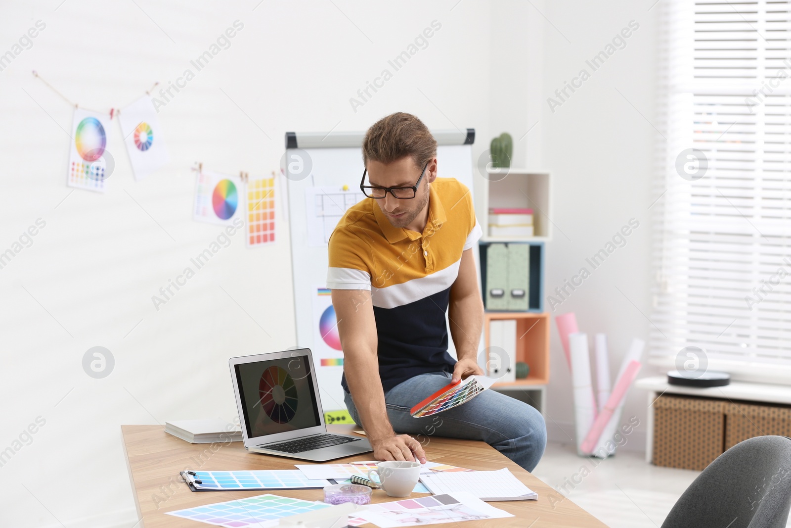 Photo of Professional interior designer at workplace in office