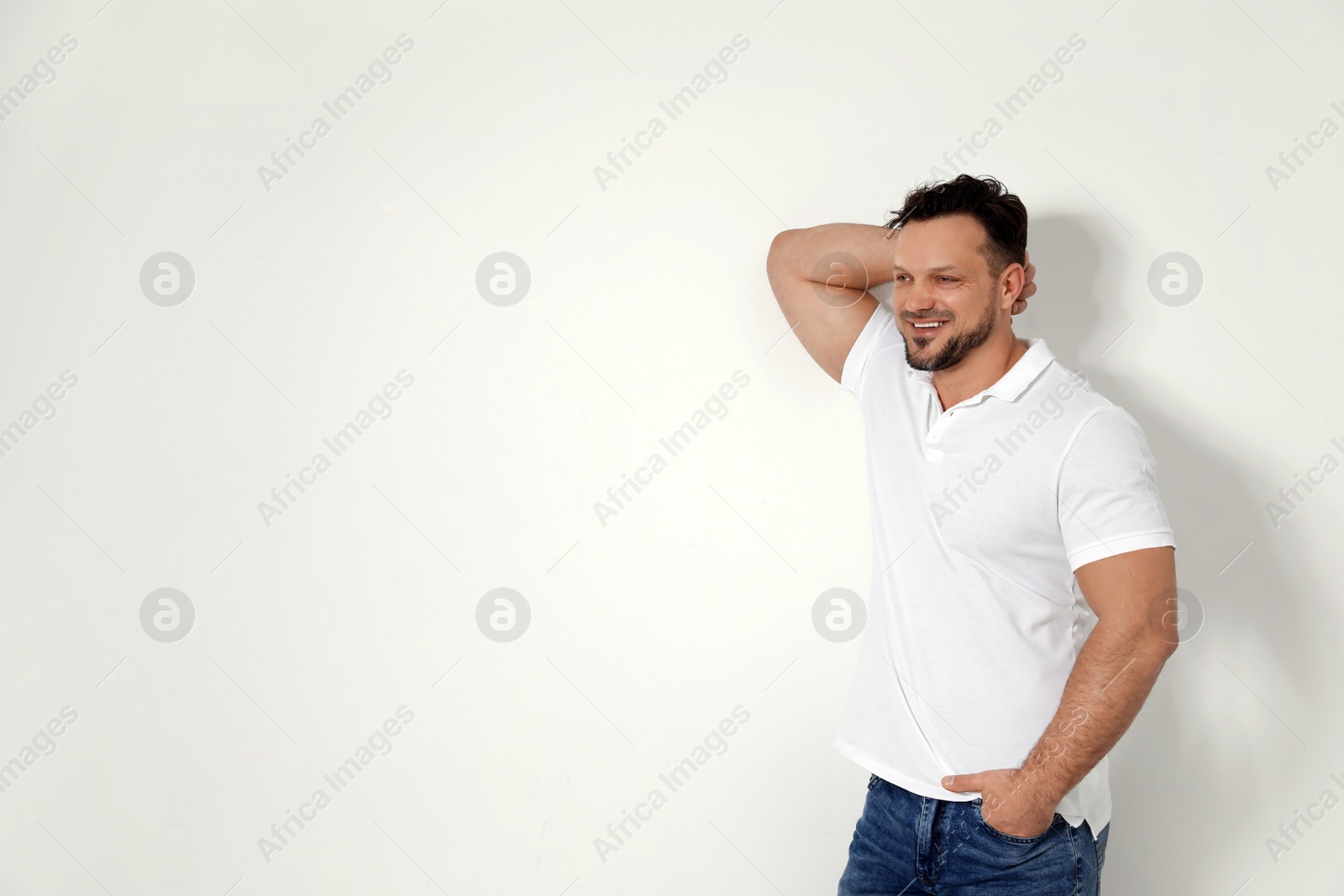 Photo of Portrait of handsome man on white background