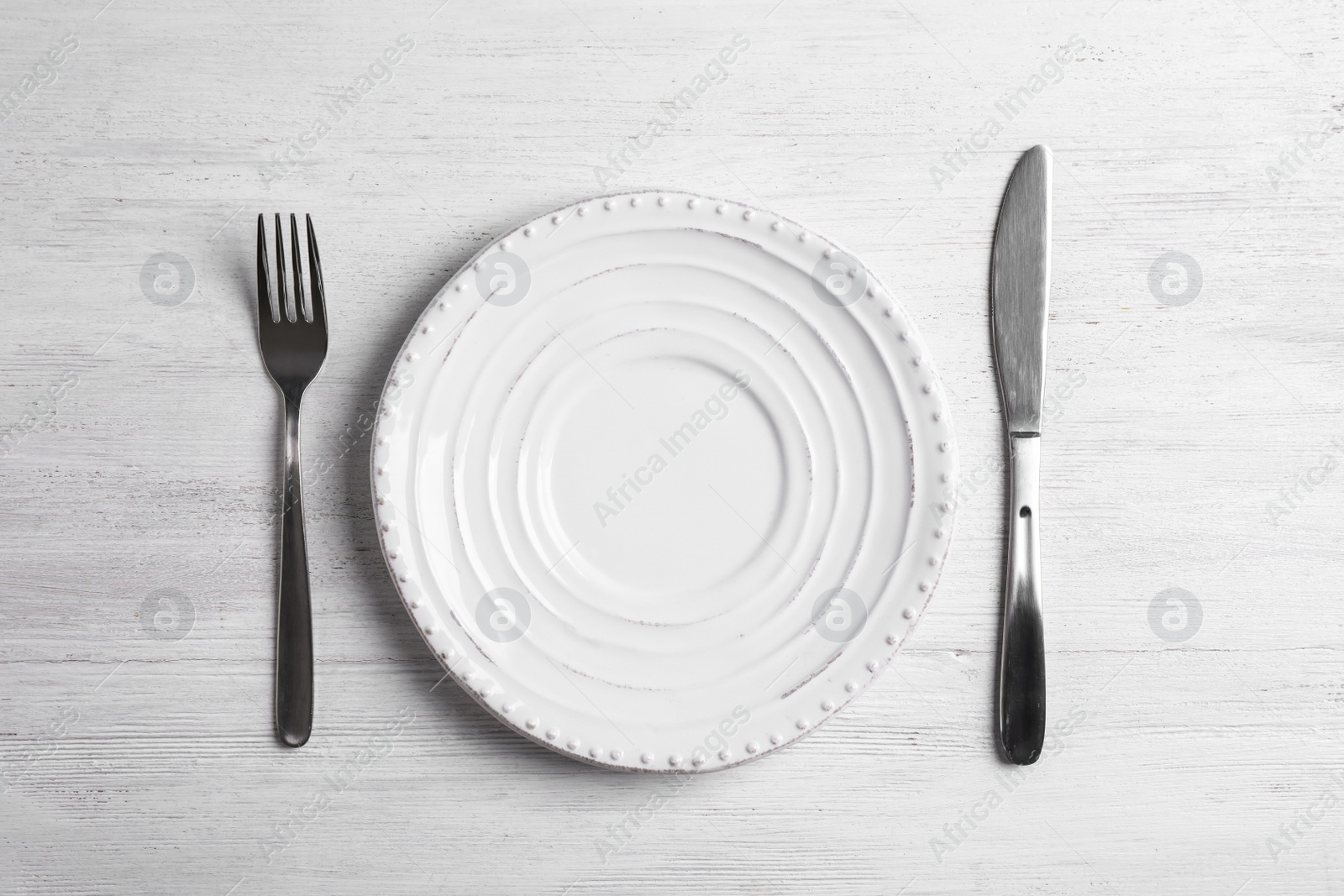 Photo of Stylish elegant table setting on white wooden background, top view