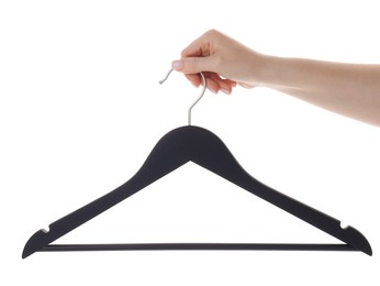Photo of Woman holding hanger on white background, closeup