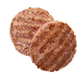 Tasty grilled hamburger patties on white background, top view