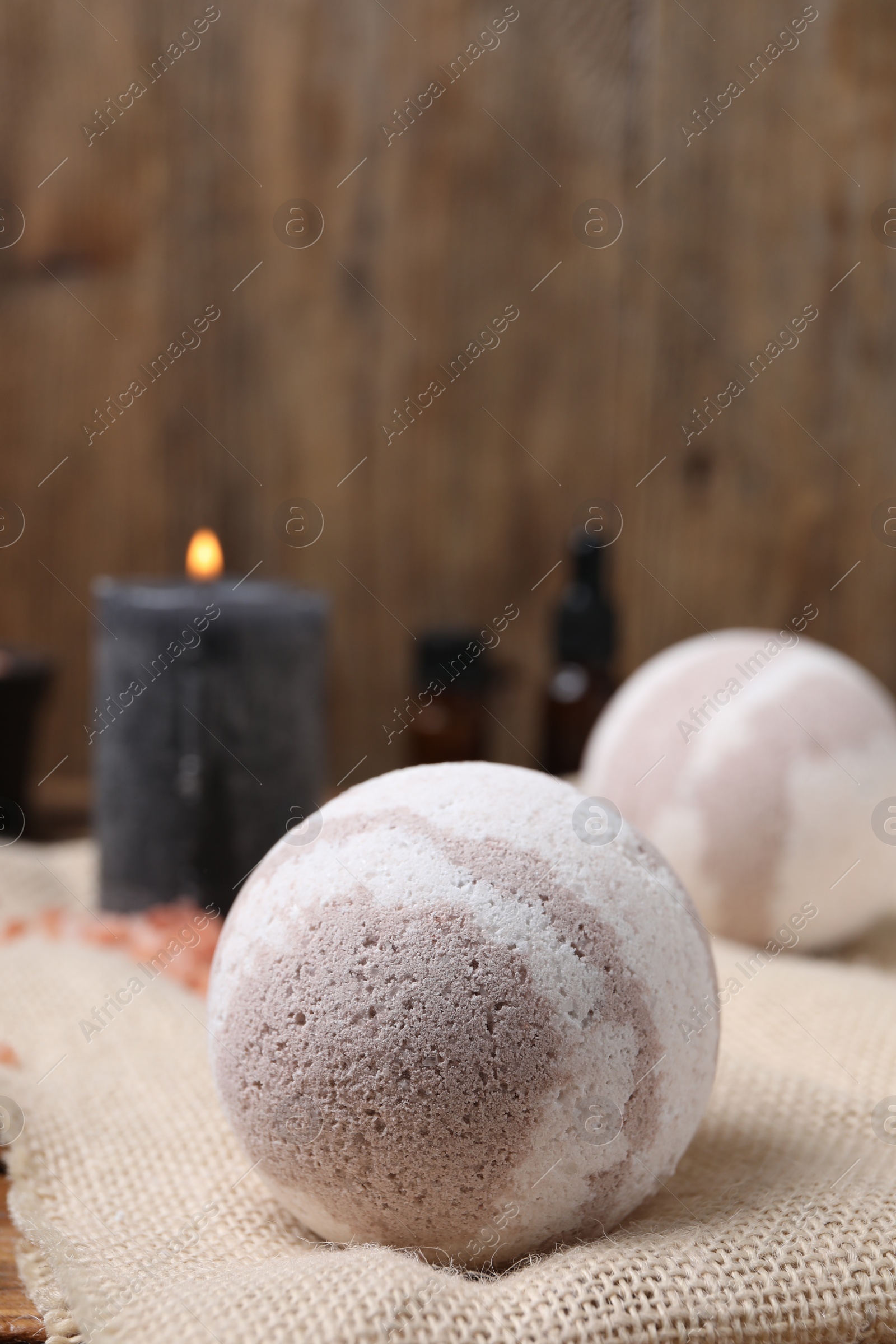 Photo of Bath bomb on table, closeup. Space for text