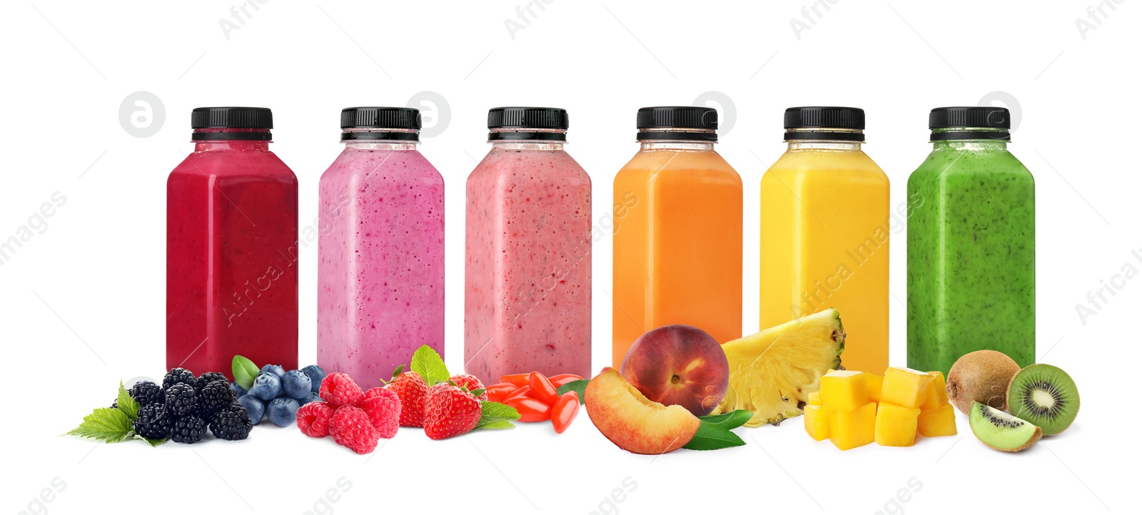 Image of Different delicious smoothies in bottles on white background. Banner design