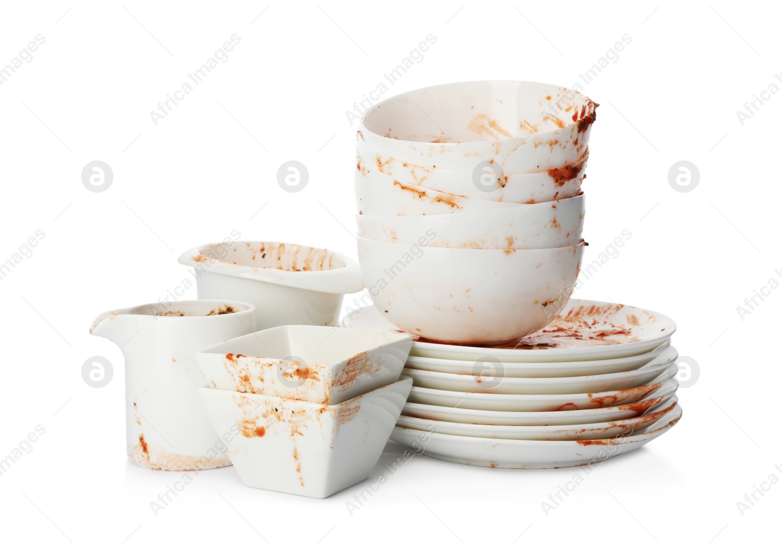 Photo of Set of dirty dishes isolated on white
