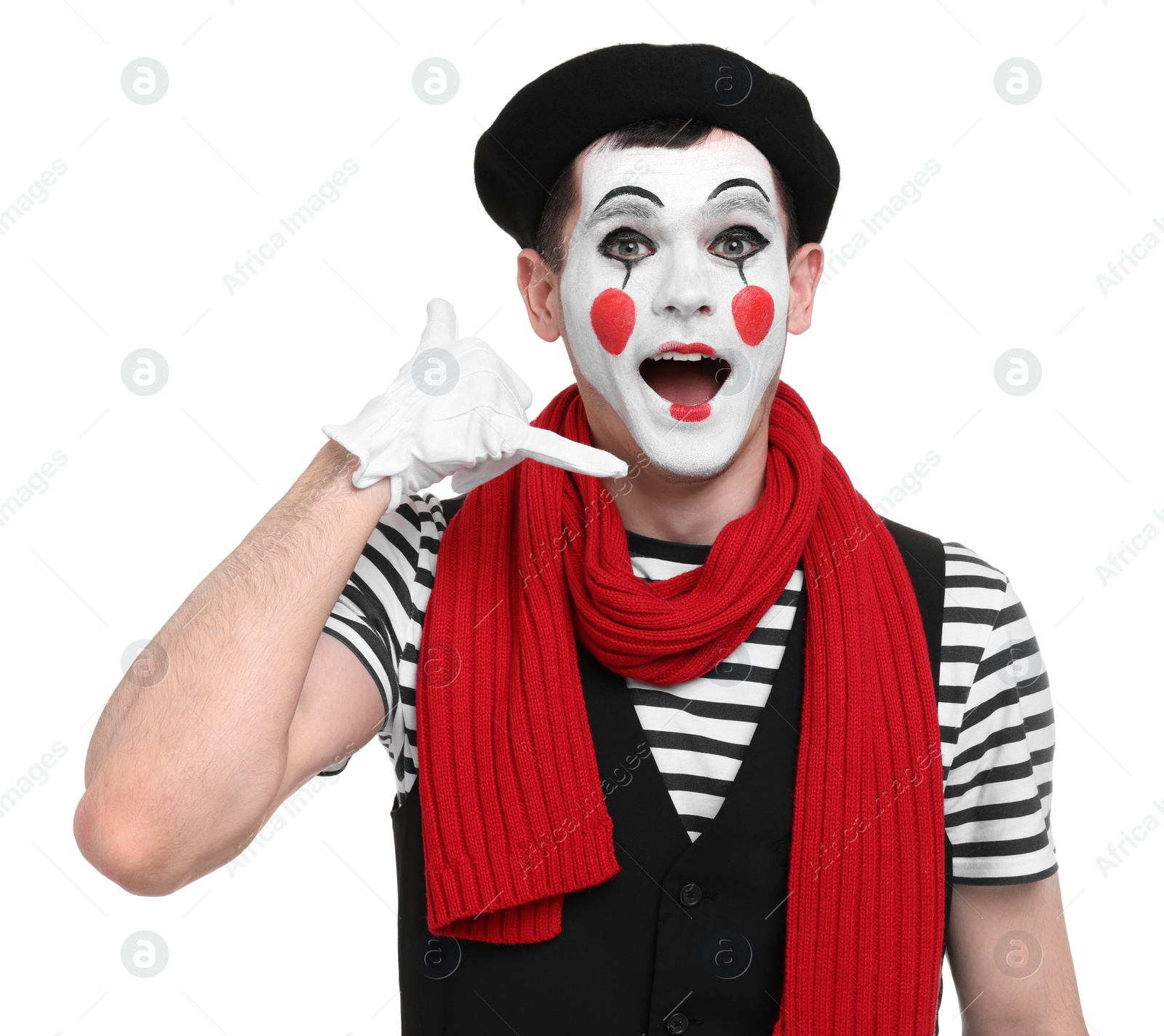 Photo of Funny mime artist showing call me gesture on white background