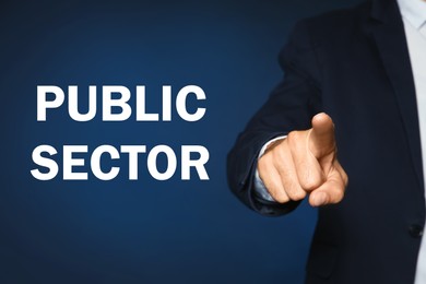 Public Sector. Businessman on dark blue background, closeup view