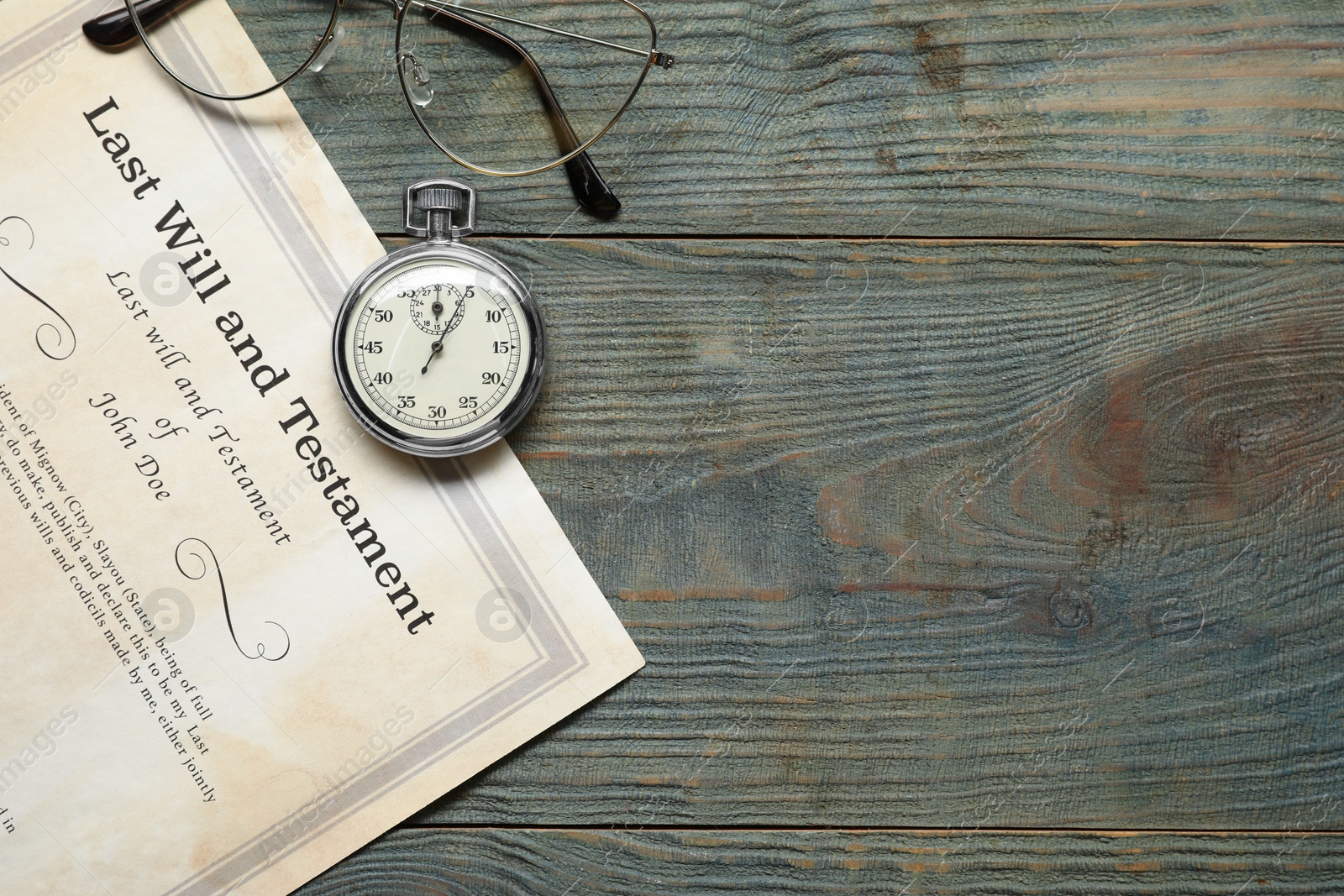 Photo of Last Will and Testament, pocket watch and glasses on rustic wooden table, flat lay. Space for text