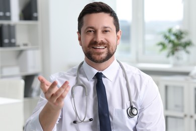 Portrait of doctor with stethoscope in clinic