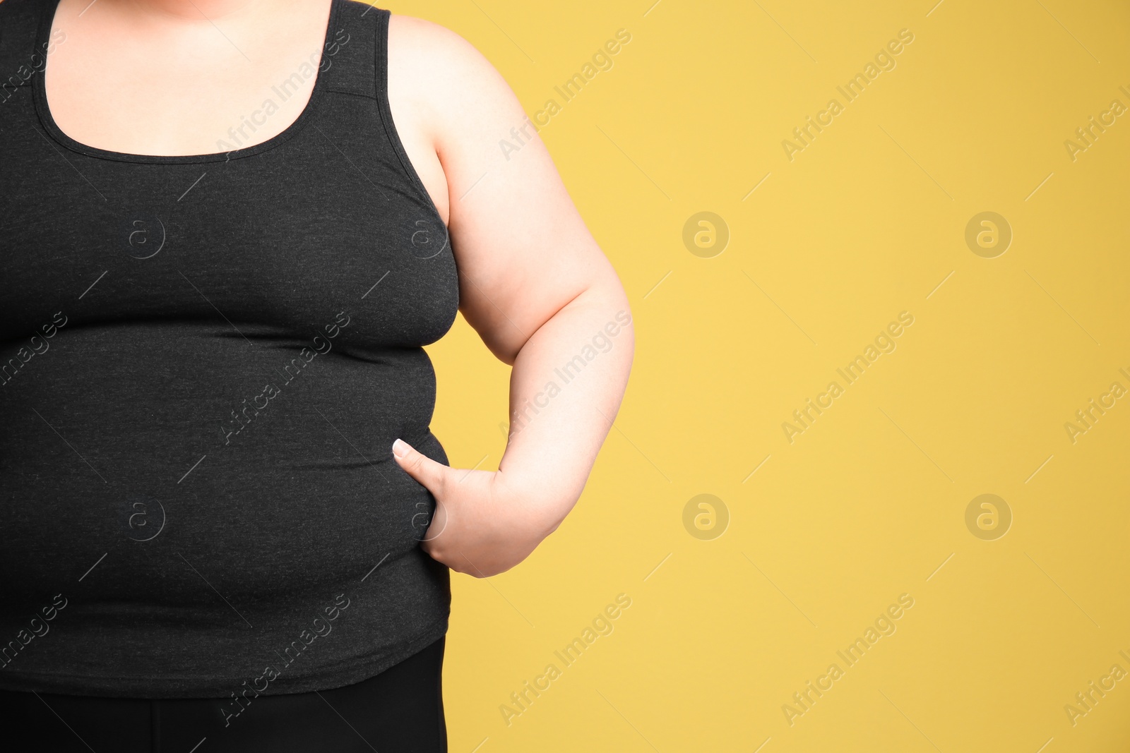 Photo of Overweight woman on color background