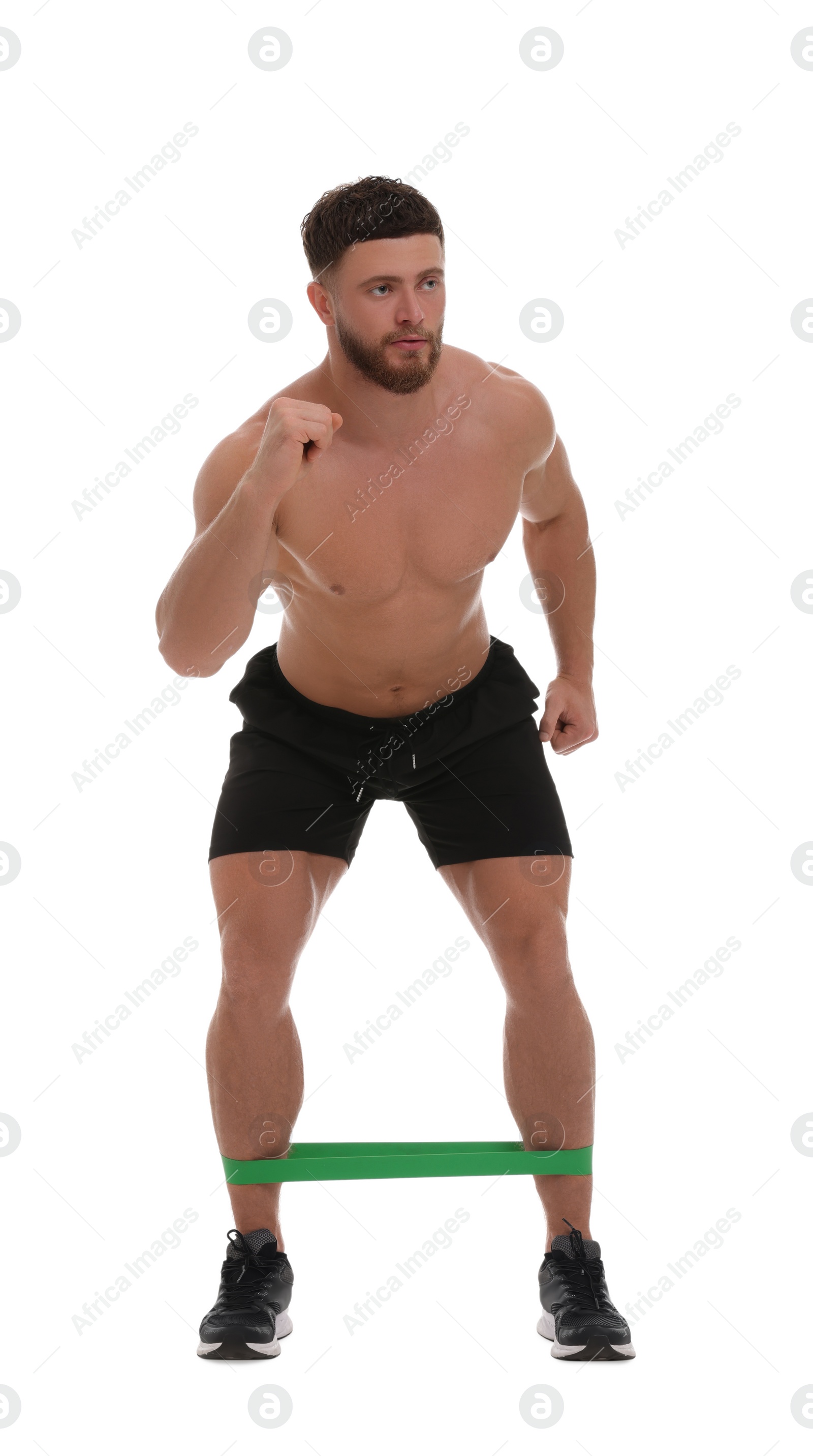 Photo of Young man exercising with elastic resistance band on white background