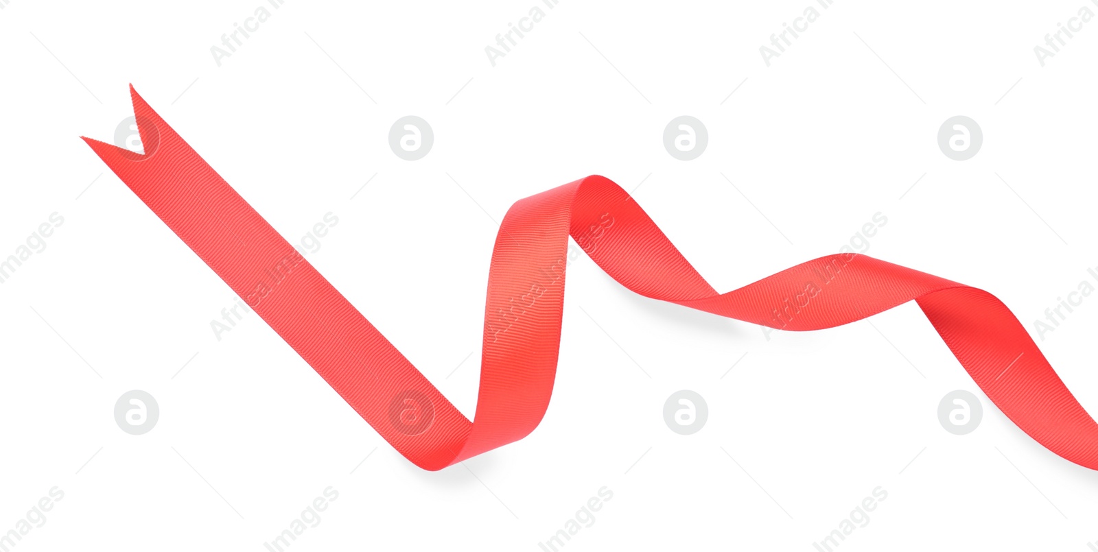 Photo of Beautiful red ribbon isolated on white, top view