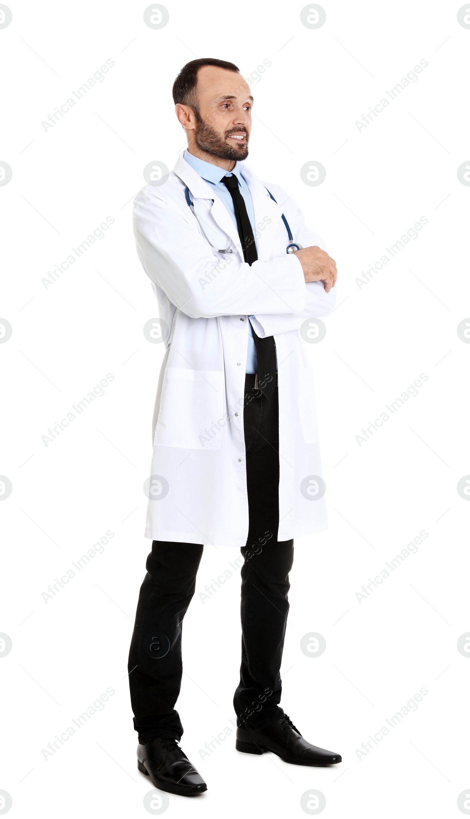 Photo of Full length portrait of male doctor isolated on white. Medical staff