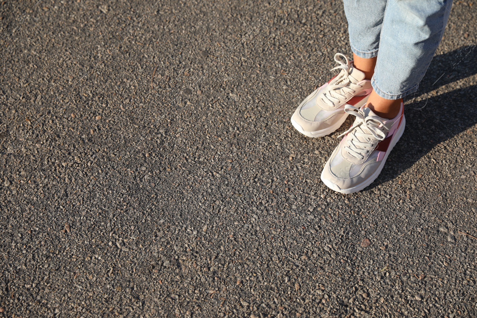 Photo of Woman walking outdoors, closeup with space for text. Choosing way concept.