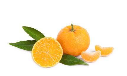 Photo of Fresh ripe tangerines with leaves isolated on white. Citrus fruit