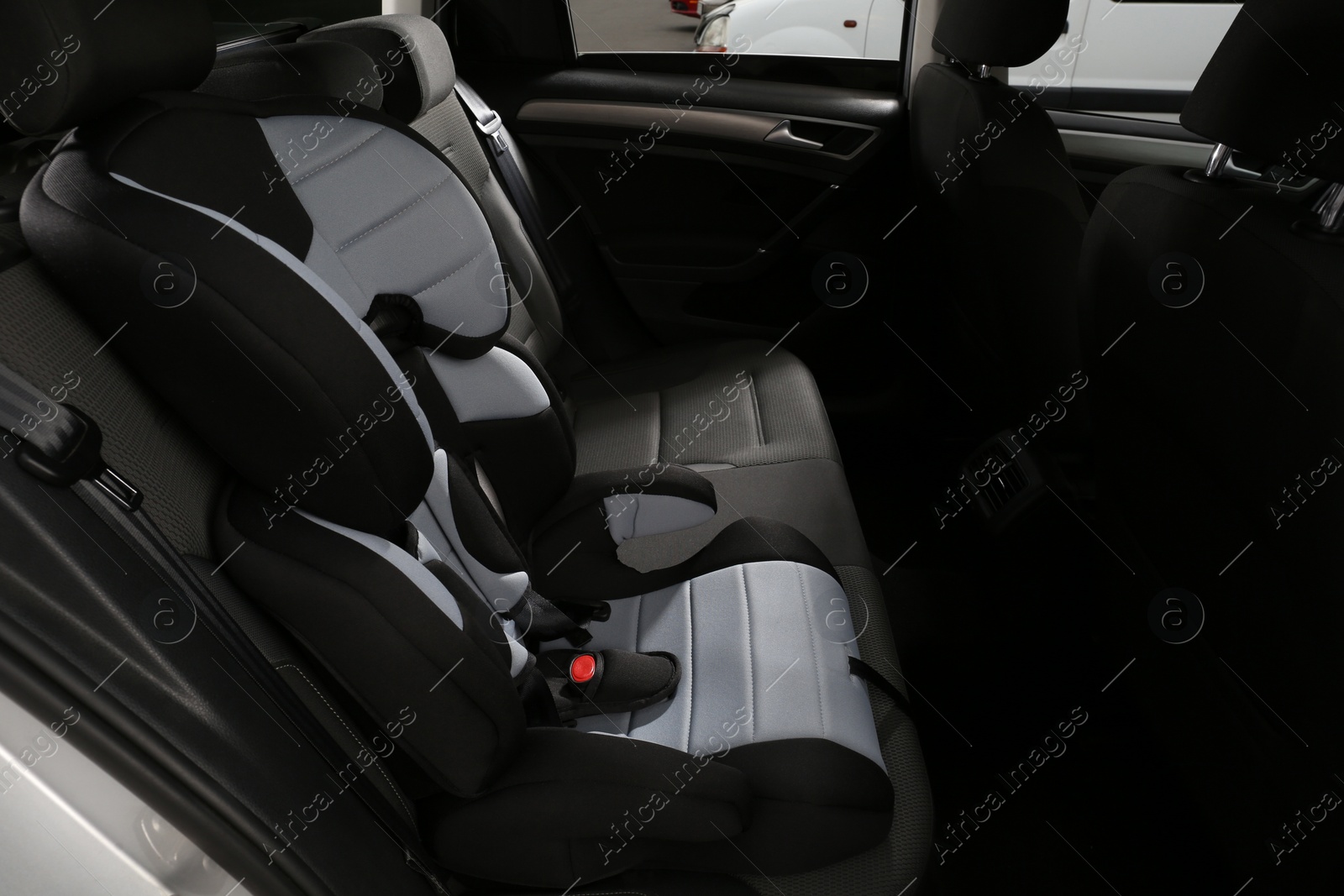 Photo of Empty modern child safety seat in car