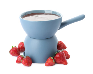 Photo of Fondue pot with chocolate and fresh strawberries isolated on white