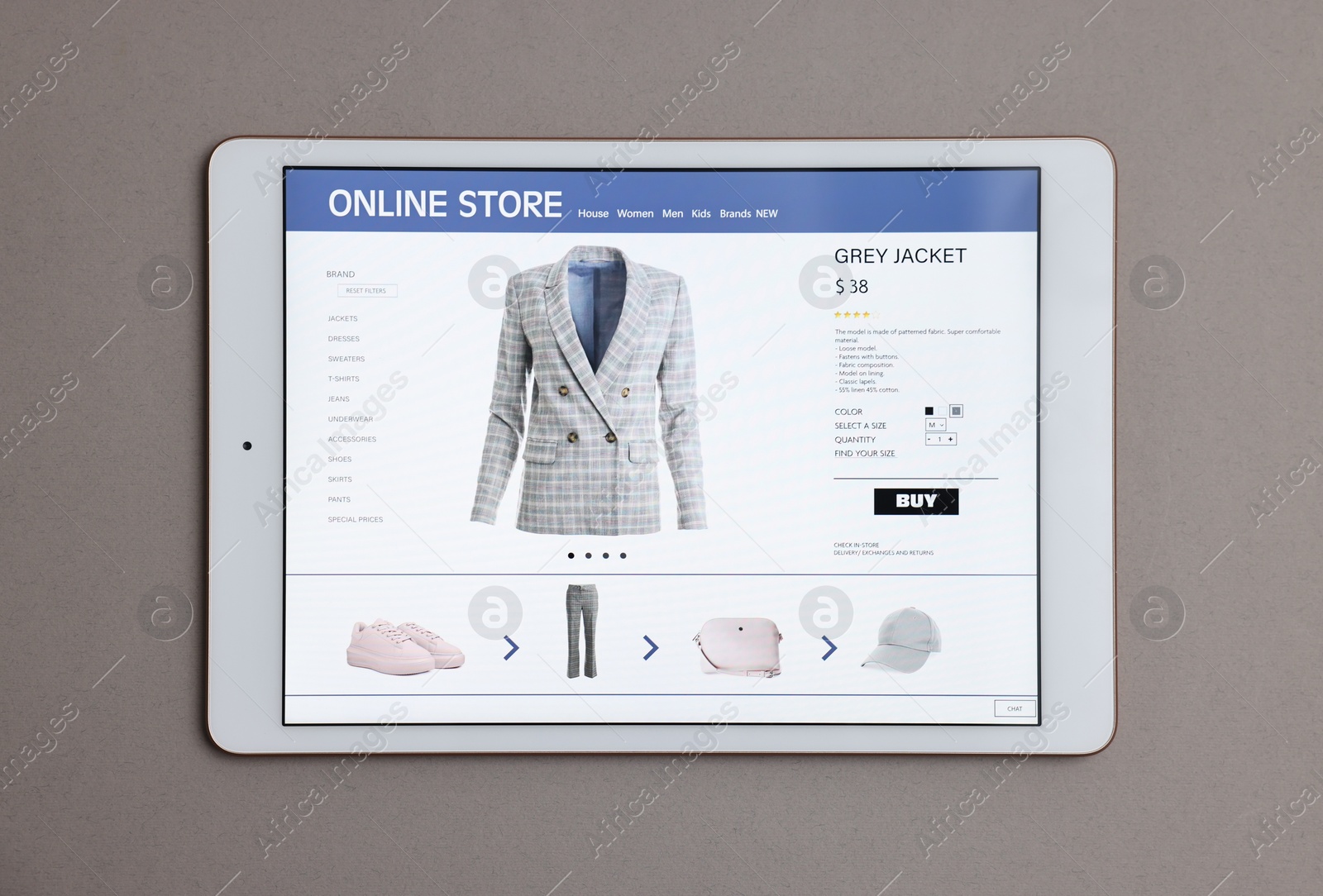 Photo of Modern tablet with open online store on grey background, top view