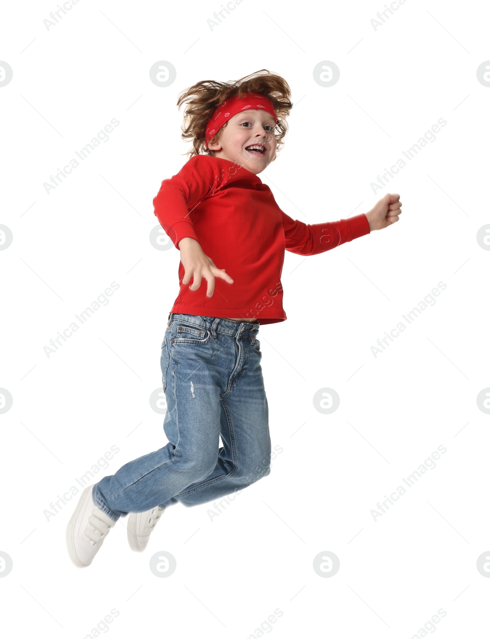 Photo of Happy little boy dancing on white background